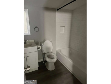 This charming 3- bedroom, 2-bathroom home offers 1,100 sq ft of - photo 8