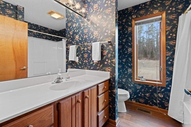 GOLF FRONT LIVING WITH DYNAMIC WATER FEATURE VIEWS! This - photo 23