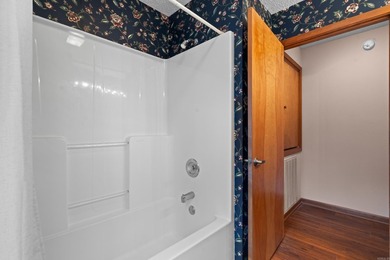 GOLF FRONT LIVING WITH DYNAMIC WATER FEATURE VIEWS! This - photo 24