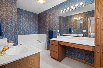 GOLF FRONT LIVING WITH DYNAMIC WATER FEATURE VIEWS! This - photo 33