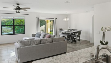 Relax on your covered lanai with serene waterfront views and - photo 6