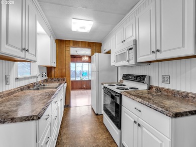 Well-Maintained Home in 55+ Park. Fresh carpet in the front room