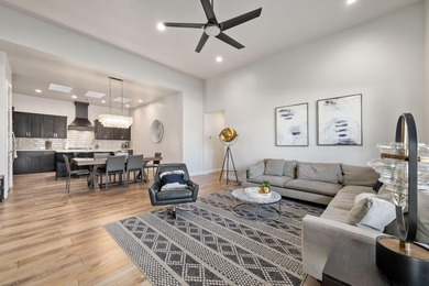 Experience elevated living in this modern 4-bed, 4.5-bath luxury