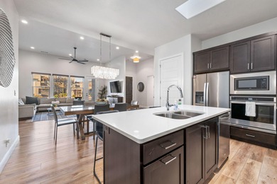 Experience elevated living in this modern 4-bed, 4.5-bath luxury