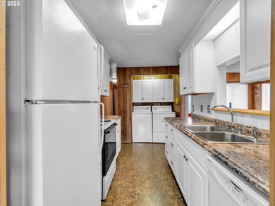 Well-Maintained Home in 55+ Park. Fresh carpet in the front room