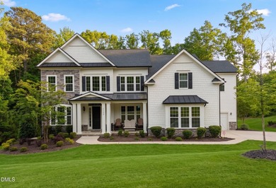 Situated on a premium 0.89-acre lot in Wake Forest's highly - photo 1
