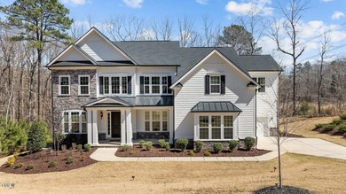 Situated on a premium 0.89-acre lot in Wake Forest's highly - photo 3