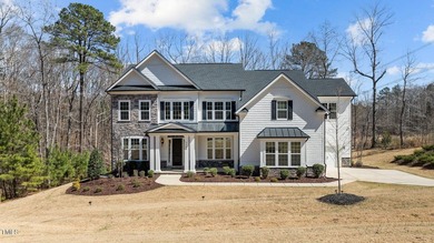 Situated on a premium 0.89-acre lot in Wake Forest's highly - photo 4