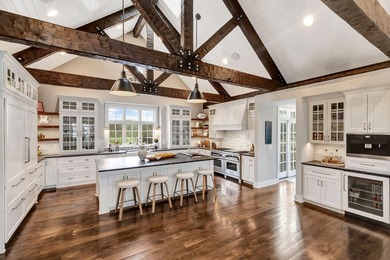 Extraordinary Custom lakefront home by Colby Construction on - photo 9