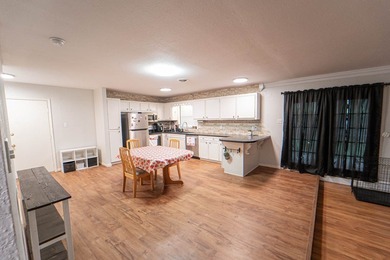 ***NEW PRICE***This delightful 3-bedroom, 2-bath home nestled in - photo 2