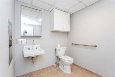 This well-maintained 5,758-square-foot commercial building is - photo 26