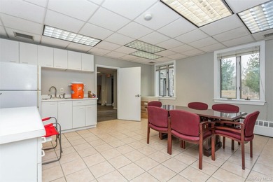 This well-maintained 5,758-square-foot commercial building is - photo 28