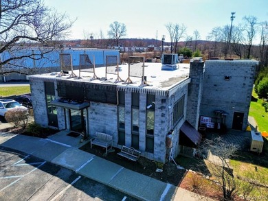 This well-maintained 5,758-square-foot commercial building is - photo 42