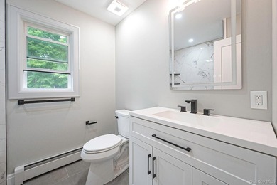 Welcome to 11 Mayfield Dr, Mastic Beach! This beautifully - photo 11