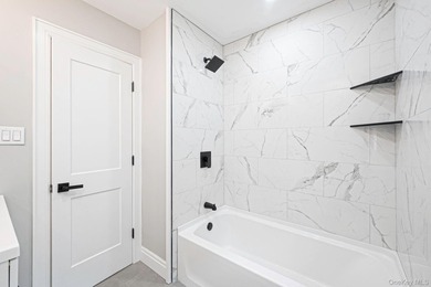 Welcome to 11 Mayfield Dr, Mastic Beach! This beautifully - photo 12