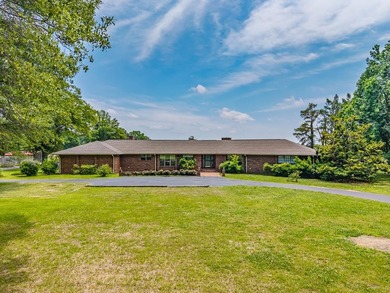 Nestled on 3.7 beautifully landscaped acres in North Mississippi - photo 1