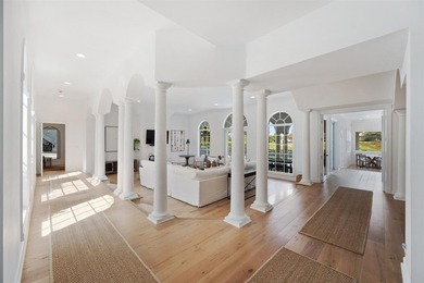 Welcome to Golf Brook Drive, an exclusive address within the - photo 4