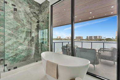 Experience brand-new waterfront perfection in Jupiter, where the