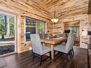 Custom-built Northwoods log sided home offering a rare, fully - photo 12