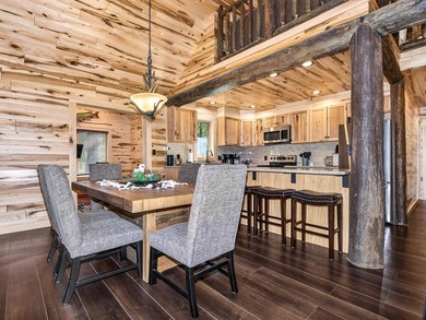 Custom-built Northwoods log sided home offering a rare, fully - photo 13