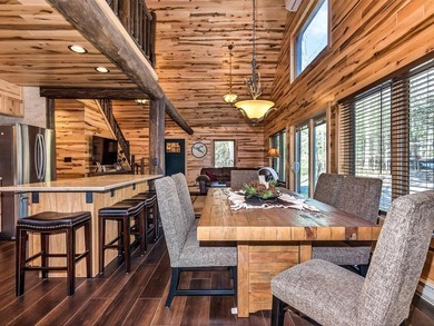 Custom-built Northwoods log sided home offering a rare, fully - photo 20
