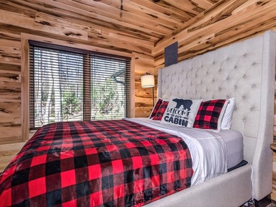 Custom-built Northwoods log sided home offering a rare, fully - photo 24