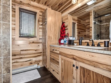 Custom-built Northwoods log sided home offering a rare, fully - photo 26