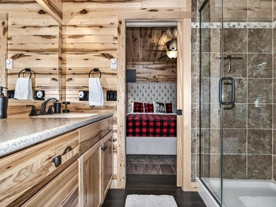 Custom-built Northwoods log sided home offering a rare, fully - photo 28