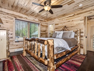 Custom-built Northwoods log sided home offering a rare, fully - photo 30