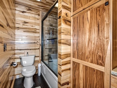 Custom-built Northwoods log sided home offering a rare, fully - photo 32