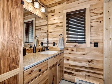 Custom-built Northwoods log sided home offering a rare, fully - photo 33