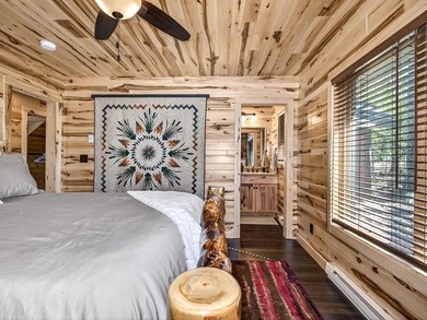 Custom-built Northwoods log sided home offering a rare, fully - photo 34