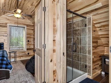 Custom-built Northwoods log sided home offering a rare, fully - photo 38