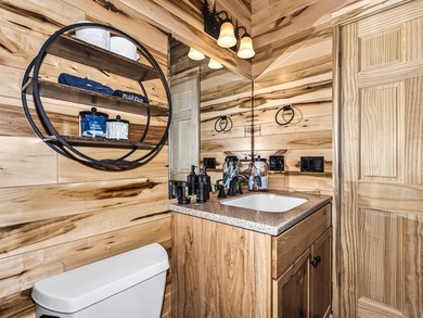 Custom-built Northwoods log sided home offering a rare, fully - photo 40
