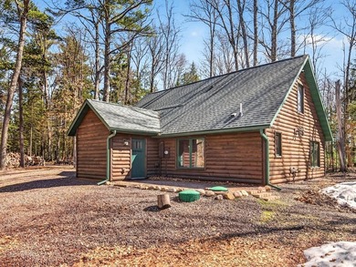 Custom-built Northwoods log sided home offering a rare, fully - photo 50