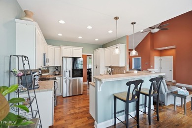 Luxury lake living meets breathtaking mountain views in this - photo 15