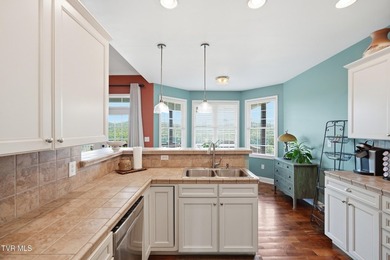 Luxury lake living meets breathtaking mountain views in this - photo 17