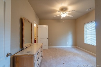 Experience low-maintenance lake living in this well-maintained - photo 15