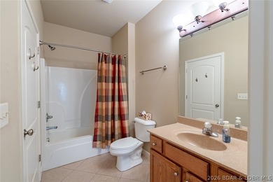 Experience low-maintenance lake living in this well-maintained - photo 17