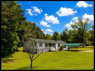 ENID LAKE! Located just 3 doors down from the entrance to - photo 1