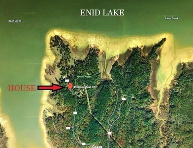ENID LAKE! Located just 3 doors down from the entrance to - photo 2