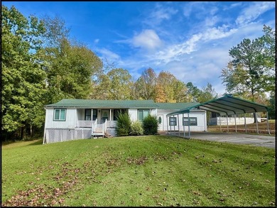 ENID LAKE! Located just 3 doors down from the entrance to - photo 3