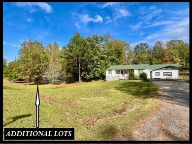 ENID LAKE! Located just 3 doors down from the entrance to - photo 4