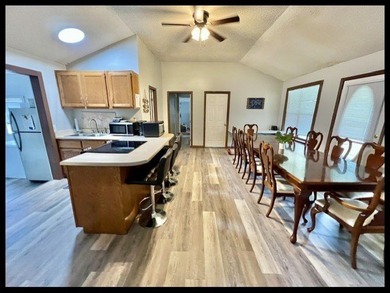 ENID LAKE! Located just 3 doors down from the entrance to - photo 7