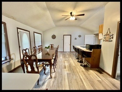 ENID LAKE! Located just 3 doors down from the entrance to - photo 8