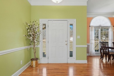 NEW PRICE! Welcome home to 104 Johns Drive, a timeless brick