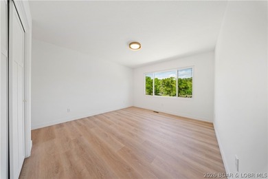 Cove location with 100 feet of lakefront, this beautifully - photo 14
