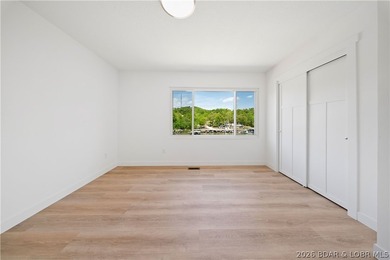 Cove location with 100 feet of lakefront, this beautifully - photo 18