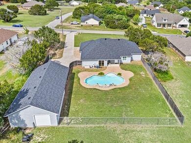 Located in the gated Indian Harbor subdivision, this 4 bedroom - photo 3