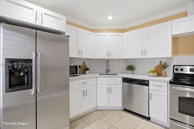 This spacious 2-bedroom, 2-bath condo offers comfort and - photo 3
